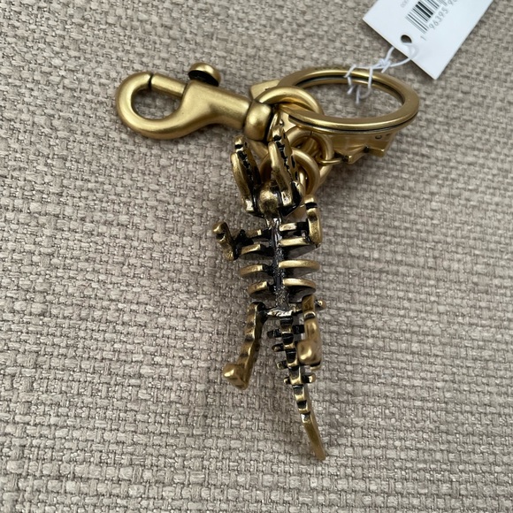 Coach Small Rexy Skeleton Bag Charm in colour brass - Picture 5 of 13